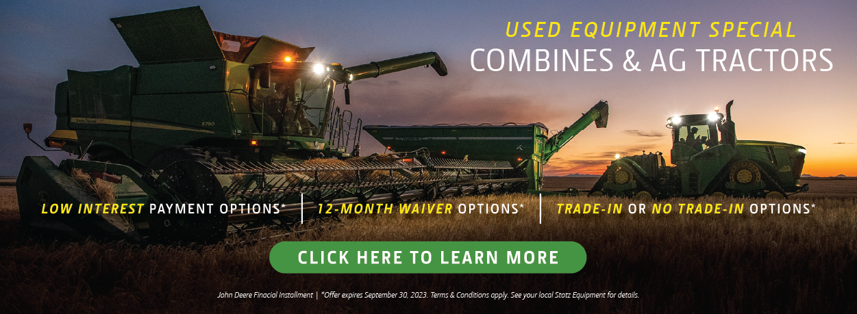 Image of combine in field with caption