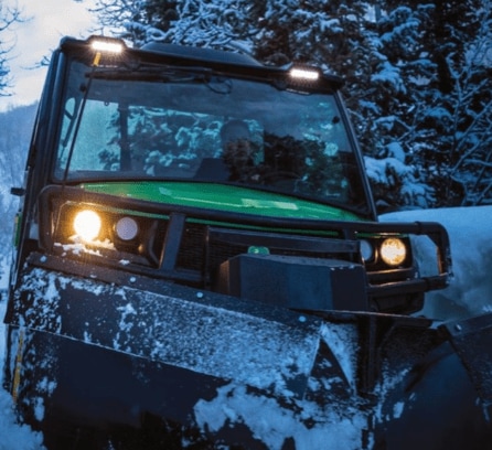 Image of Gator pushing snow with a blade