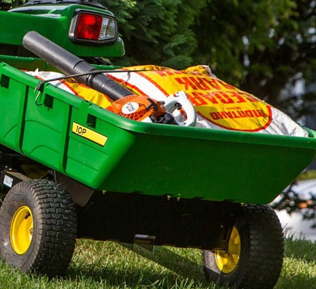 Image of Gator towing a cart