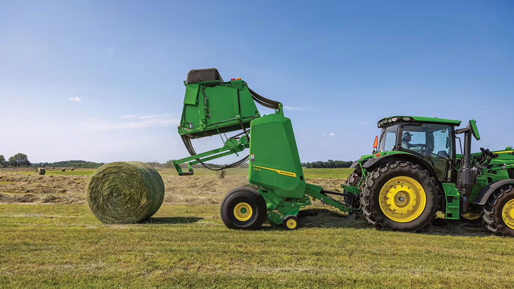 Image of John Deere 1 series round baler in action