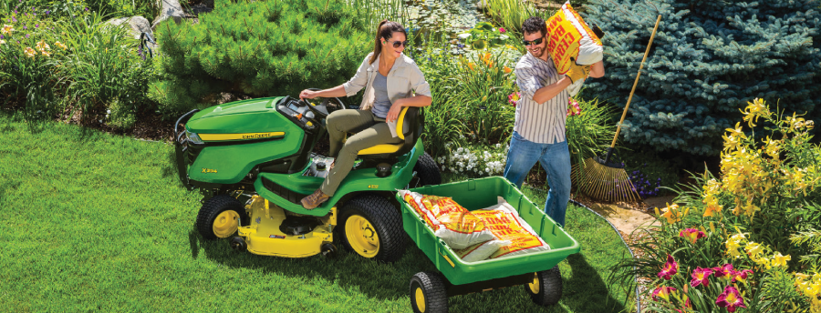 Image of man and woman working in yard.