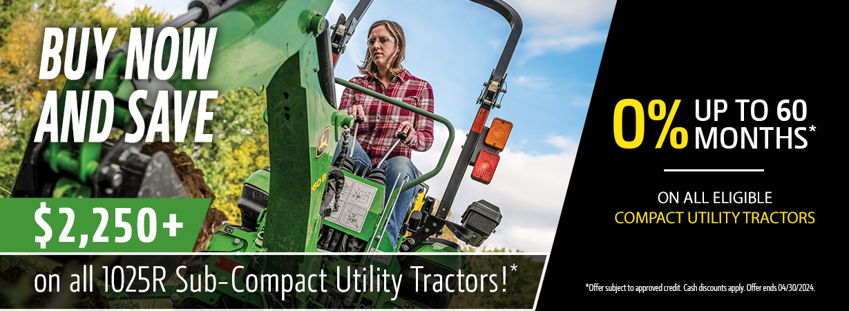 Image of woman operating a John Deere compact tractor.